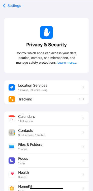 Privacy & Security settings on iPhone with access controls for apps like Location, Camera, and Contacts.
