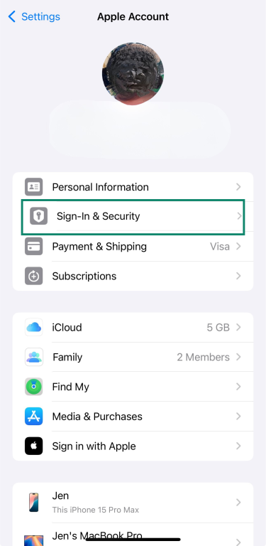 Apple ID settings with Sign-In & Security option selected on iPhone